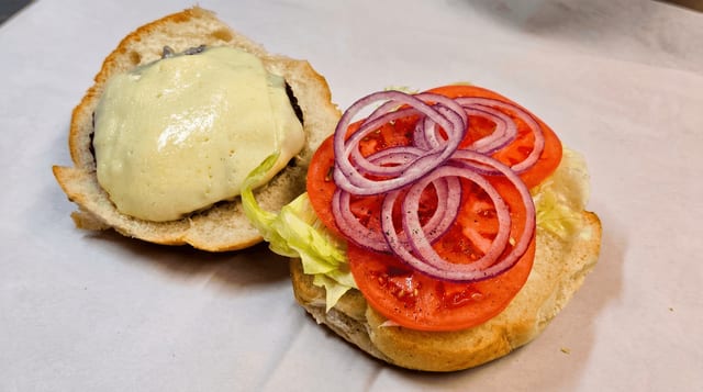 Cheeseburger with Lettuce, Tomato & Onion.